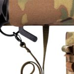 Крупний план вузла запобіжника сіткомета MITLA з кобурою MOLLE, що бере на себе роль запобіжника